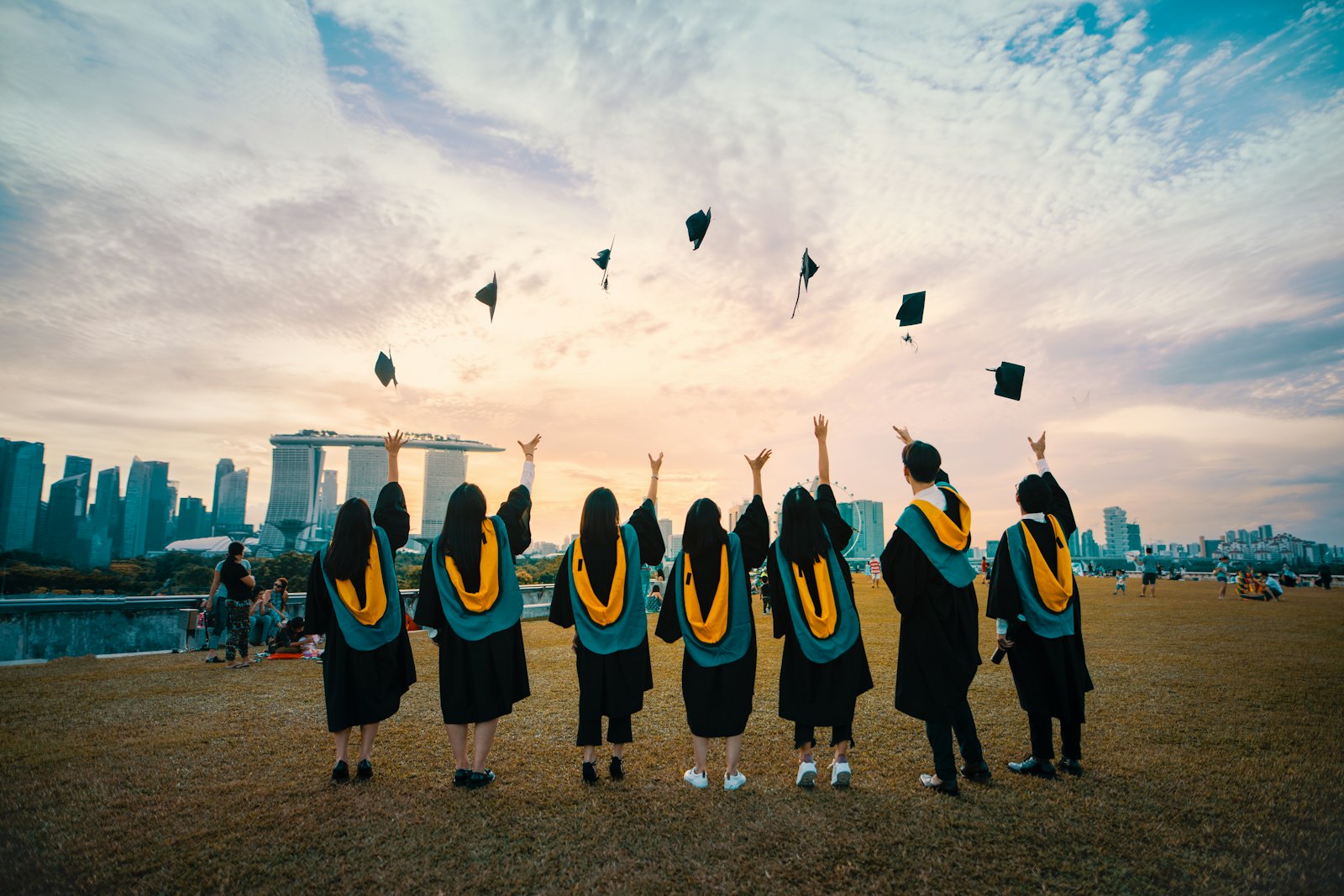 Graduates celebrating on campus